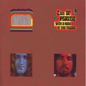 man: 2 oz's plastic with a hole in the middle