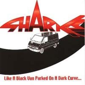 sharks: like a black van parked on a dark curve